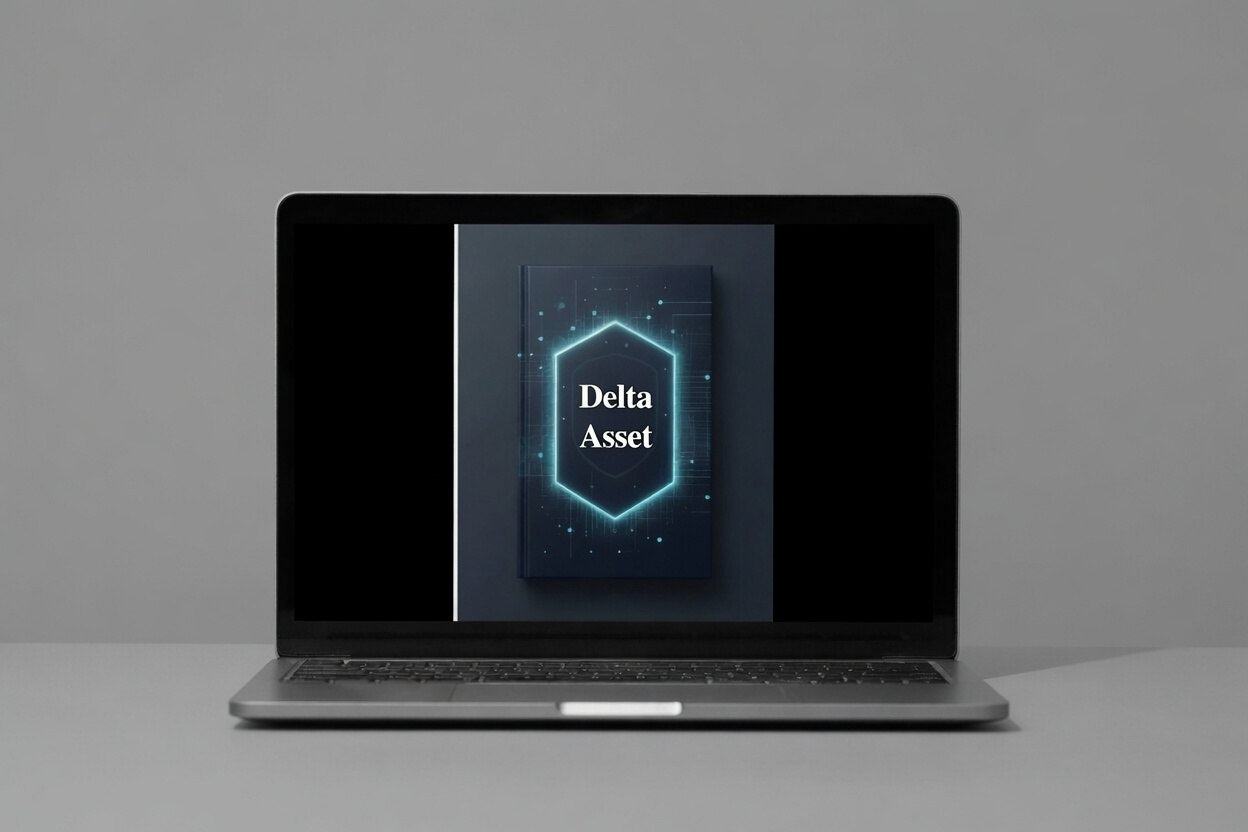 Laptop displaying a digital asset on a gray background